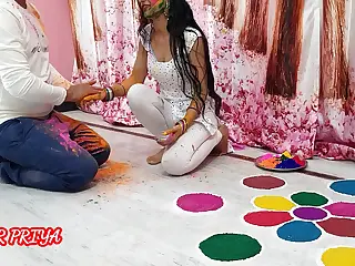 Holi special Indian Priya and brother ignite festive fun, colors blending with passionate embraces in the vibrant chaos. The smear of paint against skin adds a tactile thrill, as laughter morphs into heated breaths. Bodies move in rhythmic harmony, turning tradition into a explosion of bold, uninhibited celebration.