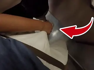 An unknown blonde MILF boldly touches a dick in the subway's dim light, the coarse feel of clothes heightening the thrill as bodies press close in the moving crowd, evolving into a spontaneous clothed sex session that pulses with electric tension and unspoken dares.